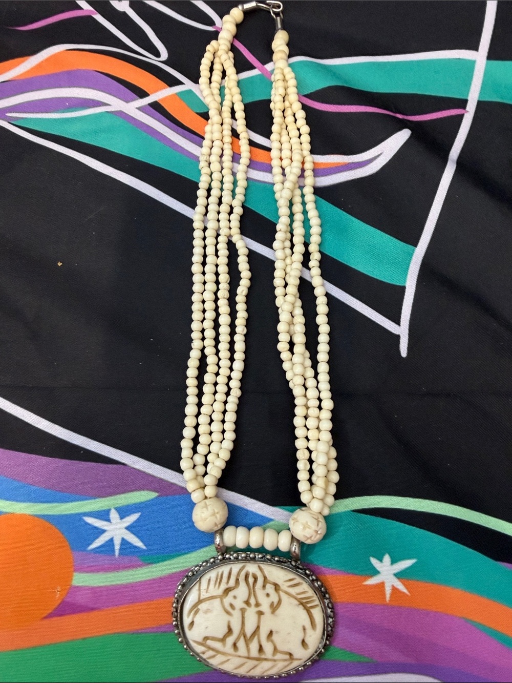 Handcrafted Ivory Bead Multi-Strand Necklace with Carved Pendant